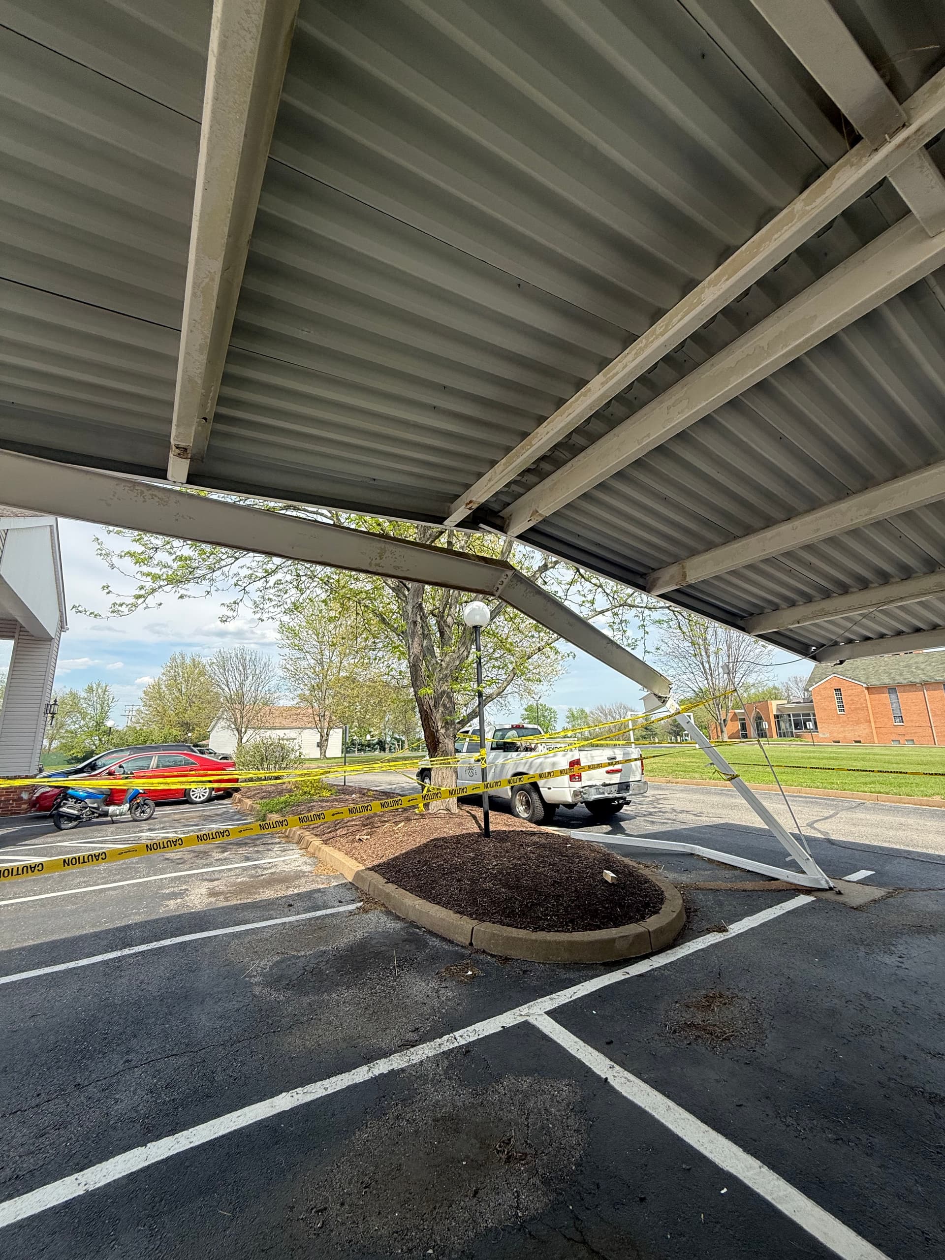 Steel Parking Cover Restored After Heavy Impact Damage image